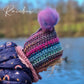 Rainbow bonnet with pompom and ties
