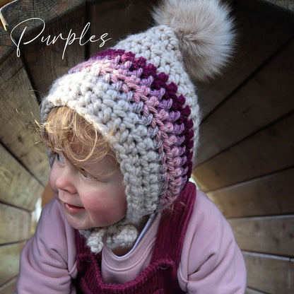 Rainbow bonnet with pompom and ties