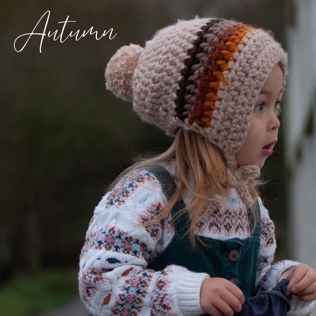 Rainbow bonnet with pompom and ties