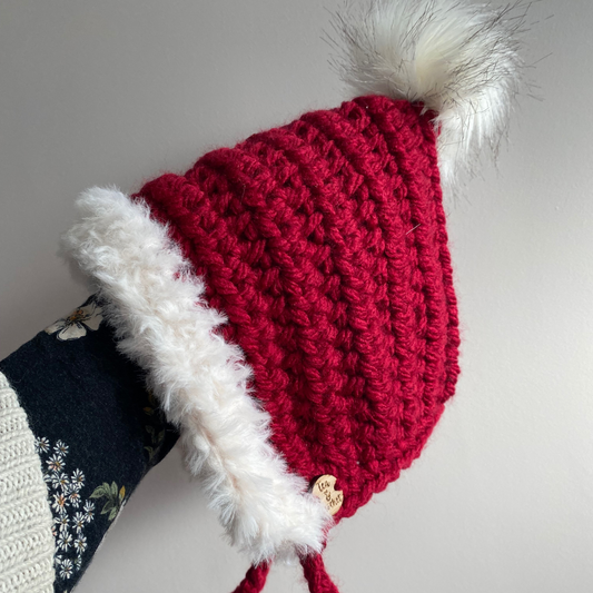 Christmas Fur trimmed pixie bonnet with faux fur pompom