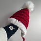 Christmas Fur trimmed pixie bonnet with faux fur pompom
