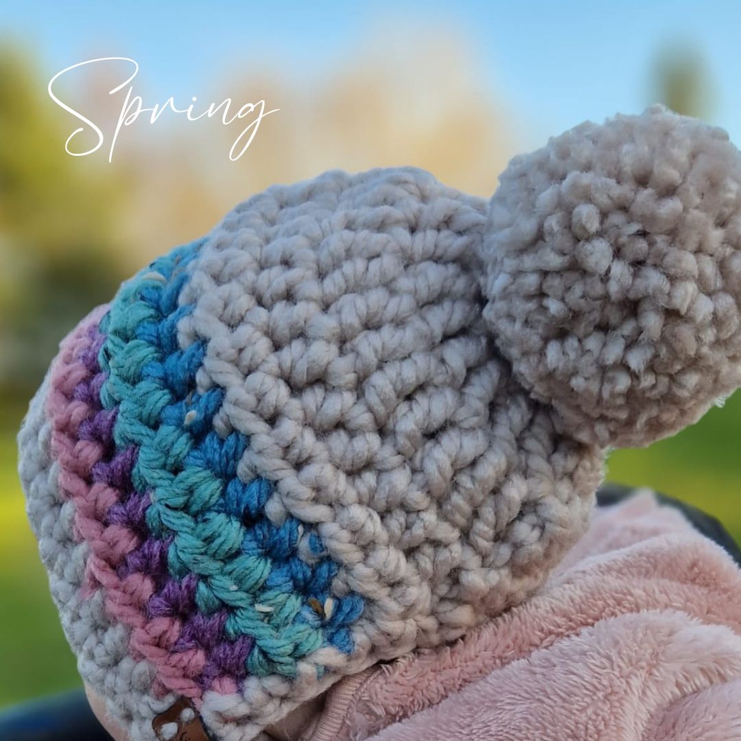 Rainbow bonnet with pompom and ties